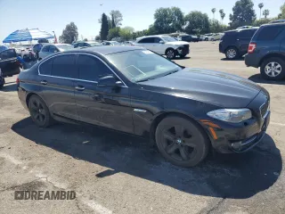 2013 BMW 5 Series 528i with VIN WBAXG5C59DDY35556, listed as a Copart auction lot 52978635 with 101,376 mi miles and Clean Title. Bid and sale history available at carsss.com. Image 4.