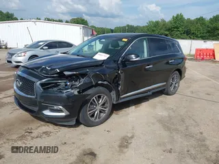 2016 Infiniti QX60 with VIN 5N1AL0MN7GC512506, listed as a IAAI auction lot 39811733 with 186,804 mi miles. Bid and sale history available at carsss.com. Image 2.