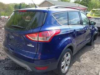 2016 Ford Escape SE z VIN 1FMCU0G90GUB57287, wystawiony jako IAAI lot #42170920 z przebiegiem 76 703 mil mil oraz . Historia ofert i sprzedaży dostępna na DreamBid. Obrazek 4.