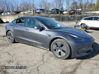 2021 Tesla Model 3 Long Range with VIN 5YJ3E1EB0MF055540, listed as a Copart auction lot 52463345 with 59,206 mi miles and Salvage Title. Bid and sale history available at DreamBid. Image 4.