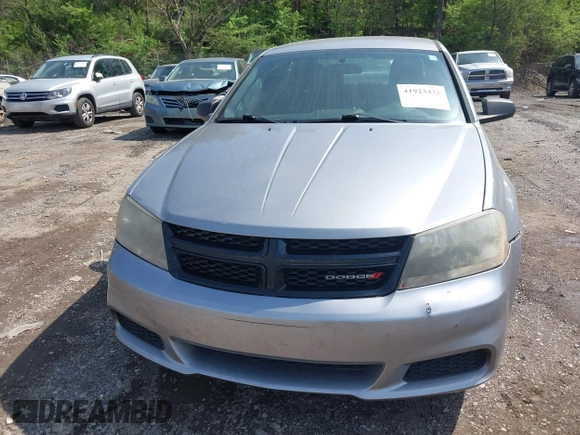 2014 Dodge Avenger SE with VIN 1C3CDZAB0EN133684, listed as a IAAI auction lot 41923432 with 158,771 mi miles and . Bid and sale history available at DreamBid. Image 6.