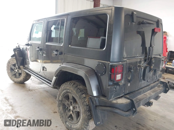 2017 Jeep Wrangler Unlimited Sahara with VIN 1C4BJWEG8HL638067, listed as a IAAI auction lot 41274352 with 57,339 mi miles. Bid and sale history available at carsss.com. Image 3.
