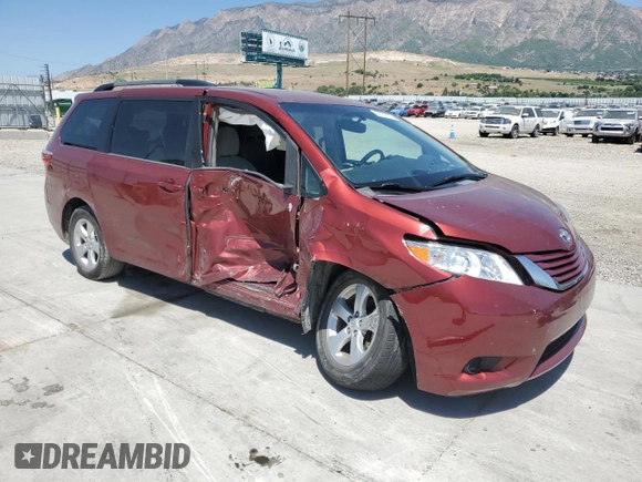 2015 Toyota Sienna LE AAS with VIN 5TDKK3DC2FS604910, listed as a Copart auction lot 59231605 with 118,974 mi miles and Salvage title. Bid and sale history available at DreamBid. Image 4.