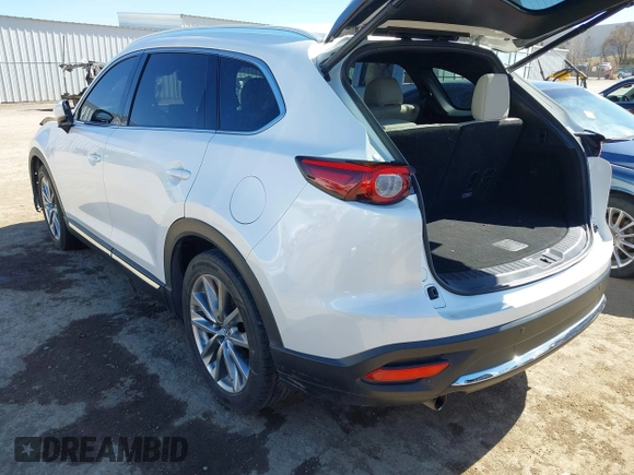 2018 Mazda CX-9 Grand Touring with VIN JM3TCADY6J0229768, listed as a IAAI auction lot 41724072 with 80,918 mi miles and . Bid and sale history available at DreamBid. Image 3.
