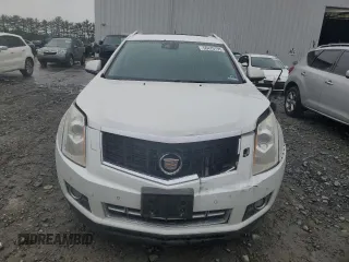 2013 Cadillac SRX Performance Collection with VIN 3GYFNHE34DS597871, listed as a Copart auction lot 56470795 with 208,504 mi miles and Salvage title. Bid and sale history available at DreamBid. Image 5.