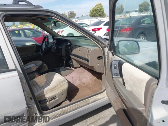 1994 Jeep Grand Cherokee Laredo with VIN 1J4GZ58YXRC325868, listed as a IAAI auction lot 42664900 with 220,149 mi miles and . Bid and sale history available at DreamBid. Image 5.