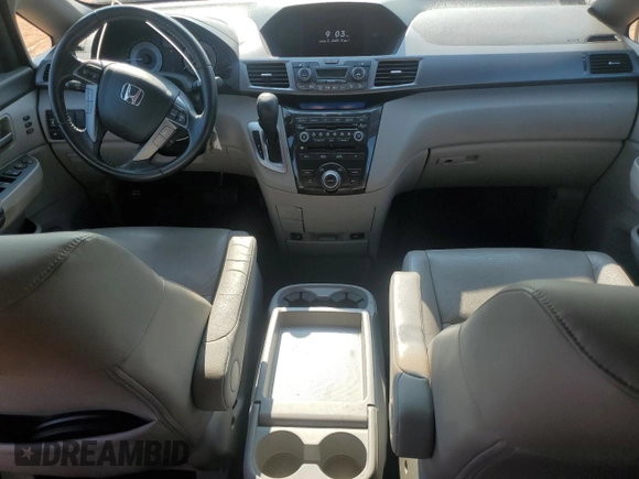 2012 Honda Odyssey Touring с VIN 5FNRL5H93CB137468, выставлен на аукционе Copart как лот 59330545 с пробегом 105 880 миль миль и Списание • Salvage title. История ставок и продаж доступна на DreamBid. Изображение 8.
