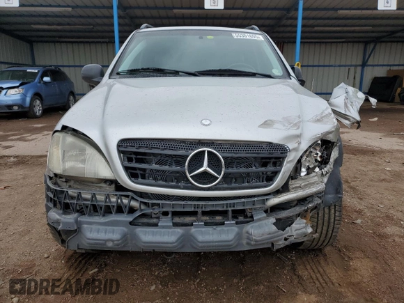 1999 Mercedes-Benz M 320/430/500 with VIN 4JGAB54E7XA078616, listed as a Copart auction lot 55301695 with 137,918 mi miles and Salvage title. Bid and sale history available at DreamBid. Image 5.
