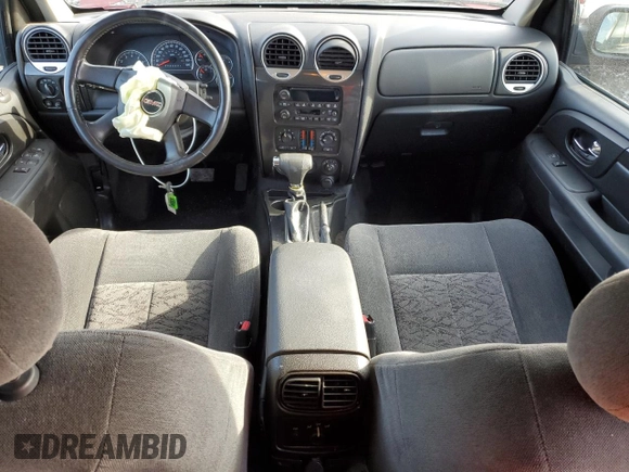 2006 GMC Envoy SLT with VIN 1GKDS13S762259102, listed as a Copart auction lot 79233224 with 125,404 mi miles and Salvage Title. Bid and sale history available at carsss.com. Image 8.