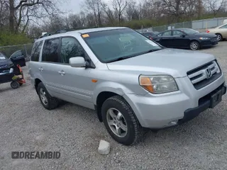 2007 Honda Pilot EX with VIN 5FNYF18457B009707, listed as a IAAI auction lot 42030214 with 229,462 mi miles. Bid and sale history available at carsss.com. Image 1.