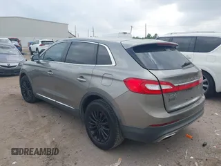 2016 Lincoln MKX Select with VIN 2LMTJ6KR8GBL63843, listed as a IAAI auction lot 41936801 with 96,829 mi miles. Bid and sale history available at carsss.com. Image 3.