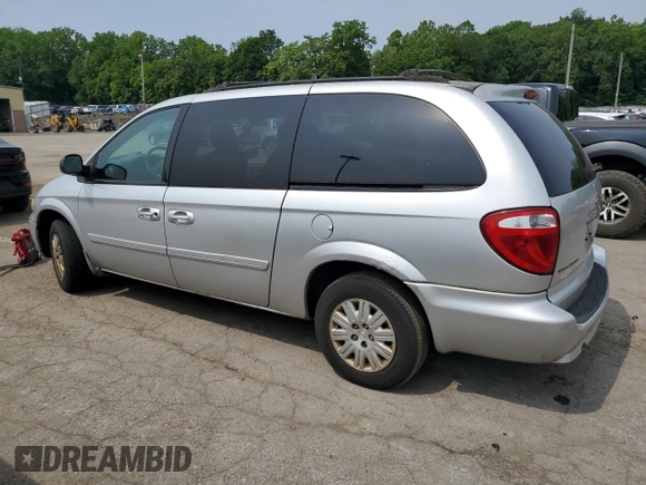 2007 Chrysler Town & Country LX z VIN 2A4GP44RX7R235204, wystawiony jako Copart lot #60727205 z przebiegiem 102 970 mil mil oraz Czysty tytuł • Clean title. Historia ofert i sprzedaży dostępna na DreamBid. Obrazek 2.