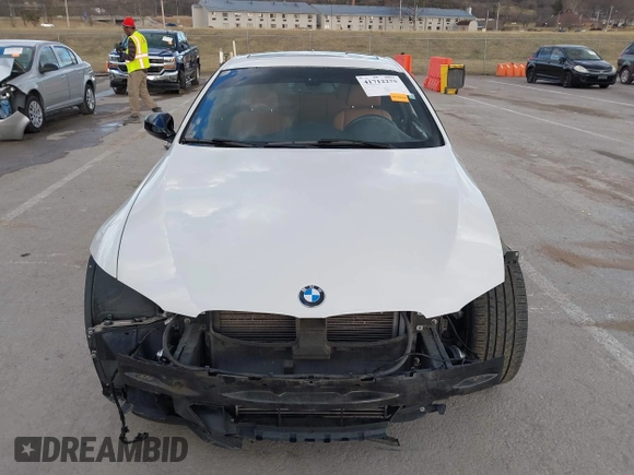 2013 BMW 3 Series 335i with VIN WBAKG7C53DJ438190, listed as a IAAI auction lot 41712275 with 126,357 mi miles. Bid and sale history available at carsss.com. Image 13.
