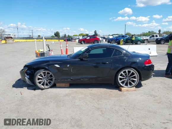 2011 BMW Z4 sDrive35i with VIN WBALM7C58BE383710, listed as a IAAI auction lot 41953452 with 102,510 mi miles. Bid and sale history available at carsss.com. Image 14.