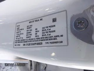 2023 Tesla Model 3 with VIN 5YJ3E1EAXPF486639, listed as a IAAI auction lot 41387797 with 18,603 mi miles and . Bid and sale history available at carsss.com. Image 9.