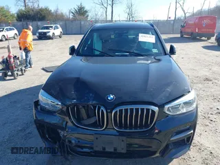 2020 BMW X3 M40i with VIN 5UXTY9C04LL304634, listed as a IAAI auction lot 41821262 with 71,731 mi miles and . Bid and sale history available at DreamBid. Image 12.