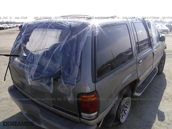 2000 Mercury Mountaineer with VIN 4M2ZU66E9YUJ34781, listed as a IAAI auction lot 21776040 with 128,003 mi miles. Bid and sale history available at carsss.com. Image 4.