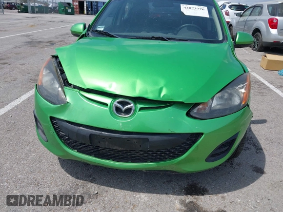 2012 Mazda 2 Sport with VIN JM1DE1KY5C0144238, listed as a IAAI auction lot 42073776 with 55,181 mi miles. Bid and sale history available at carsss.com. Image 6.