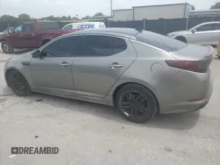 2013 Kia Optima SX with VIN 5XXGR4A62DG116593, listed as a Copart auction lot 59696705 with 120,248 mi miles and Salvage title. Bid and sale history available at DreamBid. Image 2.