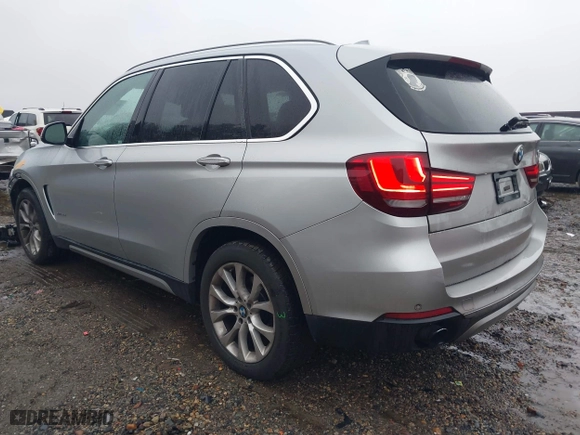 2015 BMW X5 xDrive35d with VIN 5UXKS4C51F0N06221, listed as a IAAI auction lot 41568976 with 162,442 mi miles. Bid and sale history available at carsss.com. Image 3.