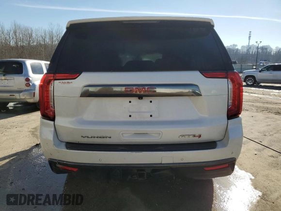2021 GMC Yukon AT4 with VIN 1GKS2CKD1MR285818, listed as a Copart auction lot 44704525 with 56,635 mi miles and Salvage Title. Bid and sale history available at carsss.com. Image 6.