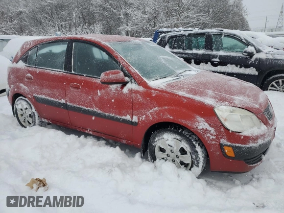 2009 Kia Rio LX with VIN KNADE243596480661, listed as a Copart auction lot 87673065 with 128,733 mi miles and Clean Title. Bid and sale history available at carsss.com. Image 4.