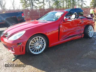 2007 Mercedes-Benz SLK 55 AMG with VIN WDBWK73F07F150189, listed as a IAAI auction lot 41334201 with 70,634 mi miles and . Bid and sale history available at DreamBid. Image 2.