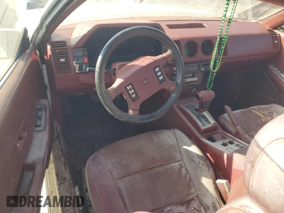 1988 Nissan 300ZX GS z VIN JN1HZ16S6JX204756, wystawiony jako Copart lot #75877174 z przebiegiem Nie podano mil oraz Szkody całkowita. Historia ofert i sprzedaży dostępna na DreamBid. Obrazek 8.