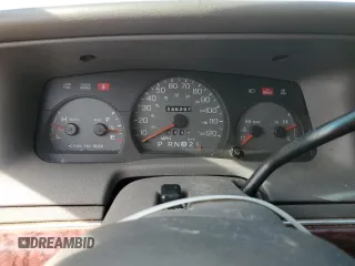 2000 Mercury Grand Marquis GS z VIN 2MEFM74WXYX699560, wystawiony jako Copart lot #57721925 z przebiegiem 246 297 mil mil oraz Szkoda całkowita • Salvage title. Historia ofert i sprzedaży dostępna na DreamBid. Obrazek 9.