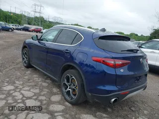 2019 Alfa Romeo Stelvio Ti z VIN ZASPAKBN5K7C58905, wystawiony jako IAAI lot #42431897 z przebiegiem 173 899 mil mil oraz . Historia ofert i sprzedaży dostępna na DreamBid. Obrazek 3.