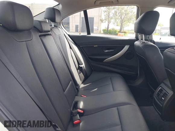 2016 BMW 3 Series 320i with VIN WBA8A9C52GK617133, listed as a IAAI auction lot 42029140 with 59,113 mi miles. Bid and sale history available at carsss.com. Image 8.