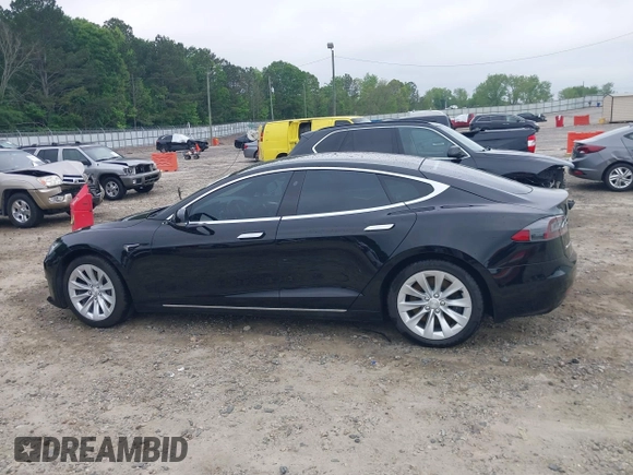 2017 Tesla Model S 60 with VIN 5YJSA1E1XHF232745, listed as a IAAI auction lot 41986834 with 89,581 mi miles and . Bid and sale history available at DreamBid. Image 14.