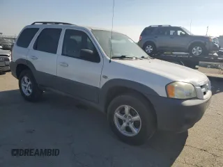 2005 Mazda Tribute i with VIN 4F2YZ02Z95KM24700, listed as a Copart auction lot 42002775 with 128,891 mi miles and Salvage Title. Bid and sale history available at carsss.com. Image 4.