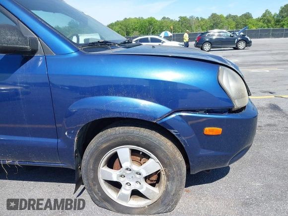 2005 Hyundai Tucson GL with VIN KM8JM12B85U233228, listed as a IAAI auction lot 42051627 with 170,742 mi miles. Bid and sale history available at carsss.com. Image 12.