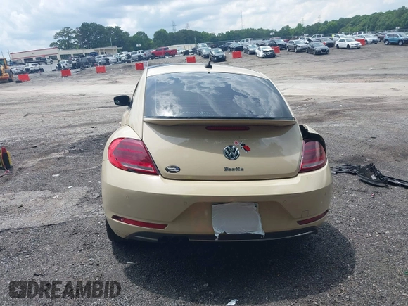2019 Volkswagen Beetle S with VIN 3VWFD7AT2KM700941, listed as a IAAI auction lot 42474867 with 43,891 mi miles and . Bid and sale history available at DreamBid. Image 17.