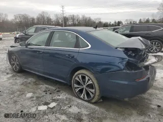 2020 Volkswagen Passat 2.0T SEL with VIN 1VWCA7A36LC012830, listed as a Copart auction lot 88077115 with 98,988 mi miles and Salvage Title. Bid and sale history available at carsss.com. Image 2.