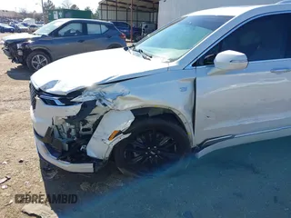 2022 Cadillac XT6 Premium Luxury with VIN 1GYKPCRS2NZ177625, listed as a IAAI auction lot 41646155 with 94,694 mi miles and . Bid and sale history available at DreamBid. Image 6.