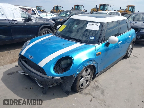 2017 MINI Hardtop 4 Door Cooper with VIN WMWXU1C53H2E17614, listed as a IAAI auction lot 41686204 with 53,409 mi miles and . Bid and sale history available at DreamBid. Image 18.