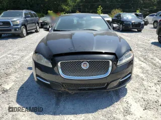 2014 Jaguar XJ Portfolio with VIN SAJWA2GZ2E8V66906, listed as a Copart auction lot 64888135 with 166,194 mi miles and Clean title. Bid and sale history available at DreamBid. Image 5.