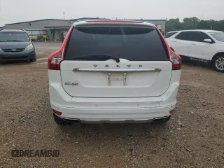 2014 Volvo XC60 3.2L z VIN YV4952DL1E2517521, wystawiony jako Copart lot #52708663 z przebiegiem 92 036 mil mil oraz Szkoda całkowita • Salvage title. Historia ofert i sprzedaży dostępna na DreamBid. Obrazek 6.