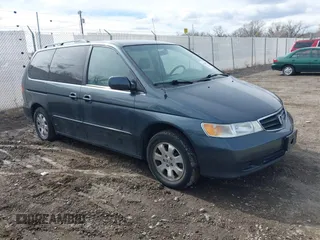 2003 Honda Odyssey EX-L with VIN 5FNRL18903B090800, listed as a IAAI auction lot 41843858 with 201,393 mi miles and . Bid and sale history available at DreamBid. Image 1.