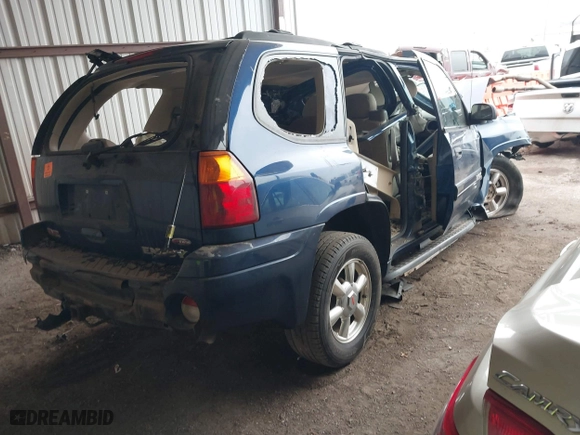 2004 GMC Envoy SLE with VIN 1GKDT13S042313270, listed as a IAAI auction lot 41700737 with 1 mi miles. Bid and sale history available at carsss.com. Image 4.