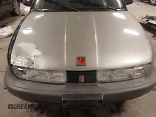 1997 Saturn SL with VIN 1G8ZH5280VZ172929, listed as a IAAI auction lot 41273214 with 134,972 mi miles. Bid and sale history available at carsss.com. Image 18.