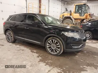2016 Lincoln MKX Reserve z VIN 2LMTJ8LP4GBL21310, wystawiony jako IAAI lot #42013169 z przebiegiem 132 384 mil mil oraz . Historia ofert i sprzedaży dostępna na DreamBid. Obrazek 1.