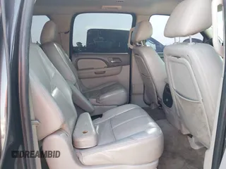 2011 Chevrolet Suburban LT with VIN 1GNSKJE34BR242629, listed as a IAAI auction lot 42043276 with 197,722 mi miles. Bid and sale history available at carsss.com. Image 8.