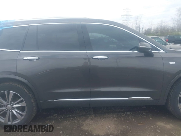 2020 Cadillac XT6 FWD Premium Luxury with VIN 1GYKPCRS0LZ136228, listed as a IAAI auction lot 41912953 with Not provided miles and . Bid and sale history available at DreamBid. Image 14.