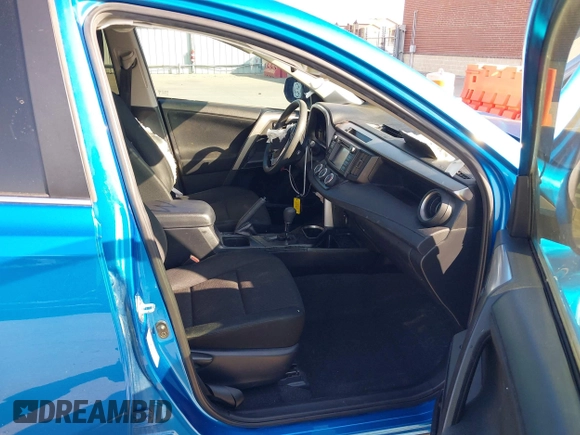 2017 Toyota RAV4 LE with VIN JTMZFREV4HJ115558, listed as a IAAI auction lot 41999381 with 94,223 mi miles and . Bid and sale history available at carsss.com. Image 5.