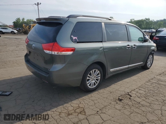 2014 Toyota Sienna XLE z VIN 5TDYK3DC2ES437683, wystawiony jako Copart lot #60549975 z przebiegiem 145 608 mil mil oraz Szkoda całkowita • Salvage title. Historia ofert i sprzedaży dostępna na DreamBid. Obrazek 3.