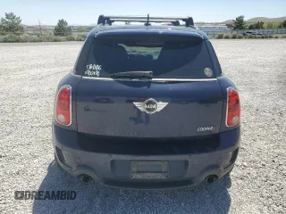 2013 MINI Countryman S ALL4 with VIN WMWZC5C50DWM15256, listed as a Copart auction lot 58080895 with 123,514 mi miles and Salvage title. Bid and sale history available at DreamBid. Image 6.