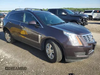 2015 Cadillac SRX Luxury Collection z VIN 3GYFNEE37FS524771, wystawiony jako Copart lot #53274144 z przebiegiem 39 348 mil mil oraz Szkoda całkowita • Salvage title. Historia ofert i sprzedaży dostępna na DreamBid. Obrazek 4.